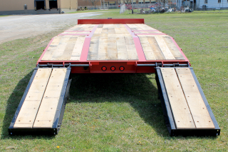 Wood covered loading ramps are 22 inches wide by 72 inches long and are laterally adjustable (shown at widest position).  Ladder style ramps are also available.