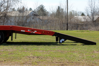 The beavertail angle of 8 degrees provides safe and easy loading of machinery. ROGERS E-Z Flip ramps have springs installed to assist lifting the ramps off the trailer deck as well as off the ground.