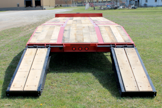 Wood covered loading ramps are 22 inches wide by 72 inches long and are laterally adjustable (shown at widest position). Ladder style ramps are also available.