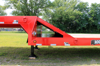 The 48-inch long x 29-degree slope deck to gooseneck ramp provides easy access to the load surface on top.

Under the ramp is a full-width storage area with lockable doors on each side of the gooseneck. 