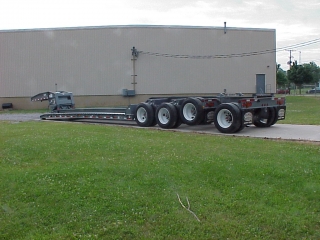 This trailer has air ride suspension, air lift on the 3rd axle and a removable 4th axle - which can be flipped onto the rear.

The design of the 3rd and 4th axles gives maximum capacity when needed, and fuel and tire savings when not.