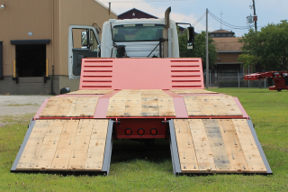 Ramps are extra-wide at 38-inches for the easy loading of various machines.

The oak-covered beavertail has a 7-degree load angle to the platform deck.