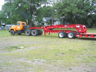 It features a tandem-axle Jeep Dolly and the patented 