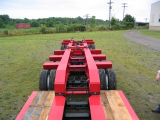 The rear frame is detachable so that additional deck can be inserted.

Additional weight distribution can be achieved by using camber blocks at the joint of the detachable deck.