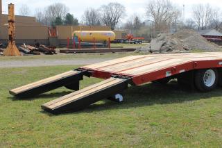 The beavertail angle of 8 degrees provides safe and easy loading of machinery. ROGERS E-Z Flip ramps have springs installed to assist lifting the ramps off the trailer deck as well as off the ground.