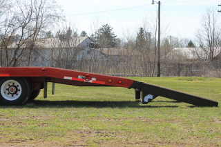 The beavertail is 72 inches long and provides an easy and safe 8 degree loading angle.  The E-Z Flip loading ramps are equipped with heavy duty torsion springs to assist in lifting the ramps - both off the trailer and off the ground.