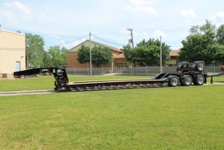 Photo caption: Rogers Brothers Corporation has been designing and manufacturing high performance lowbed semi-trailers with capacities ranging from 20 tons to over 100 tons for nearly 110 years.  Custom-engineered trailers are designed to meet the needs of the transportation, oil, gas, steel, mining, utility and heavy-haul industries. 