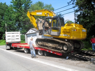 Rueben Schwartz regularly hauls a 160 John Deere track hoe and a 750 John Deere dozer on his Rogers® TAG25XXL trailer.