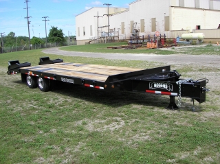 ROGERS CR35, the 35-ton capacity detachable gooseneck lowed.  ROGERS MH35, the 35-ton capacity fixed gooseneck rear loading trailer.  ROGERS TAG20XXL, the 20-ton capacity drawbar tag-along.