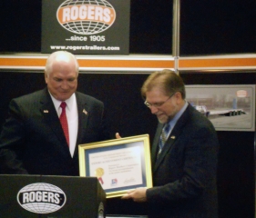 From left to right: Lyn Doverspike, Director of the Pittsburgh office of the U.S. Commercial Service, Mark Kulyk, President of Rogers Brothers Corporation, U. S. Congressman Mike Kelly.  Congressman Mike Kelly presented Mark Kulyk with The U.S. Commercial Service's Export Achievement Award.  Following the award ceremony, Mark Kulyk conducted a tour of the Rogers® factory.  This 121-ton capacity trailer was built by Rogers for a copper mining company in Peru.